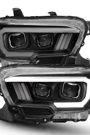 ANZO 2016-2017 Toyota Tacoma Projector Headlights w/ Plank Style Switchback Black w/ Amber Seasonal Sale